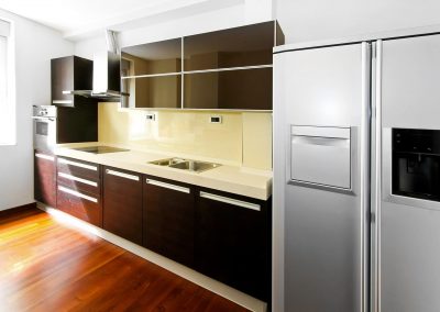 Interior of contemporary kitchen with dark counter