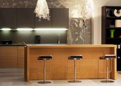 Interior of modern kitchen with wooden counter