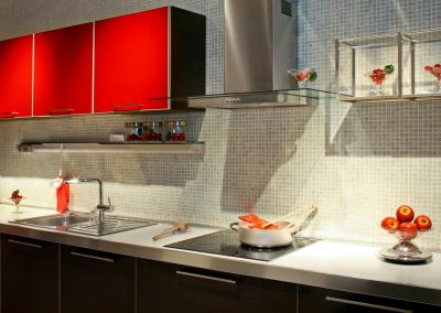 Modern kitchen counter with red details and lobster