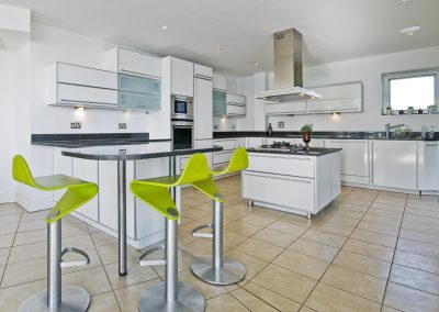 amazing modern penthouse kitchen with breakfast bar