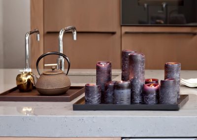 kitchen table with candles and teapot