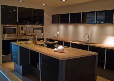 Modern design trendy kitchen with black and wood elements