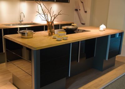 Modern clean design trendy kitchen made of black wooden elements